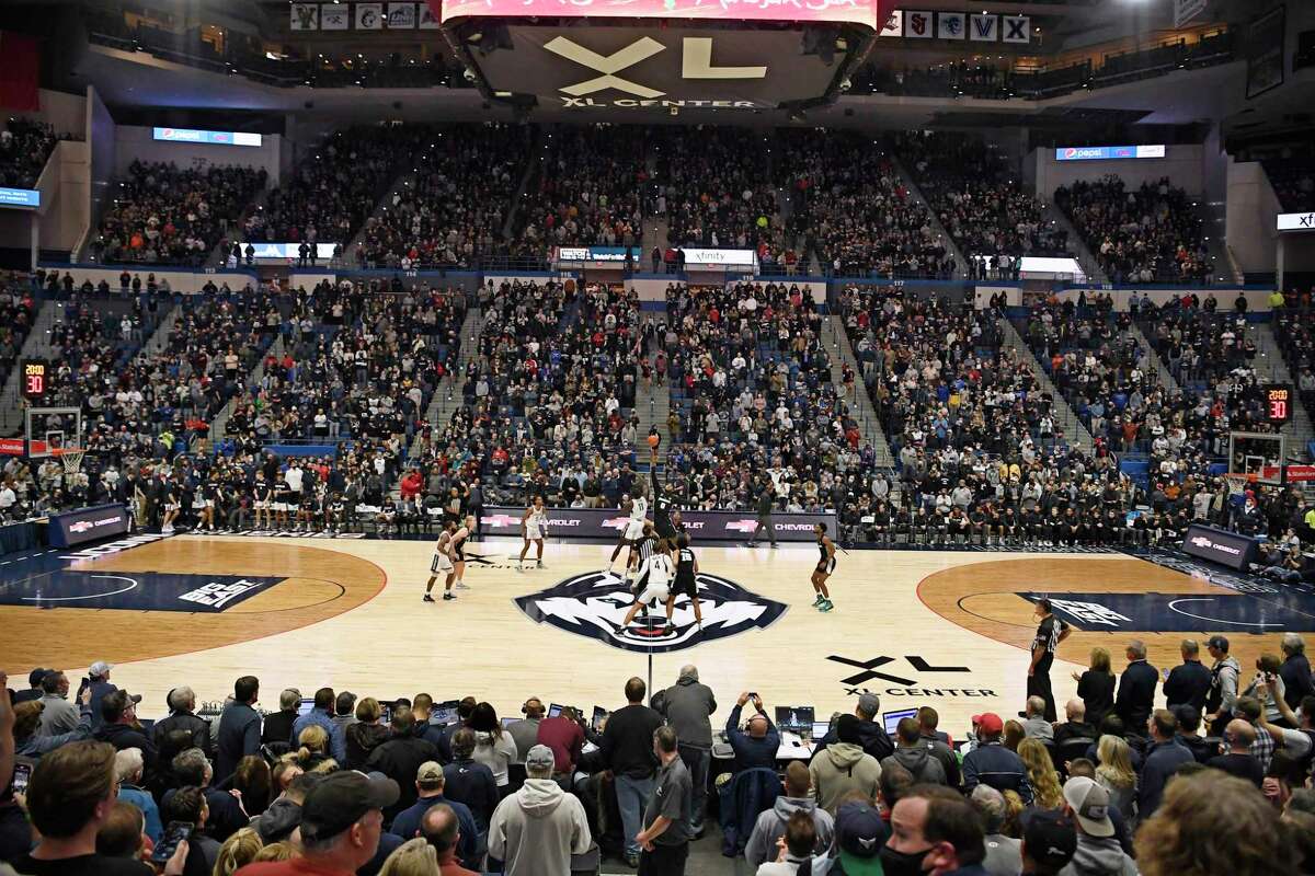 UConn and Providence tip off in a sell-out arena in the first half of an NCAA college basketball game, Saturday, Dec. 18, 2021, in Hartford.