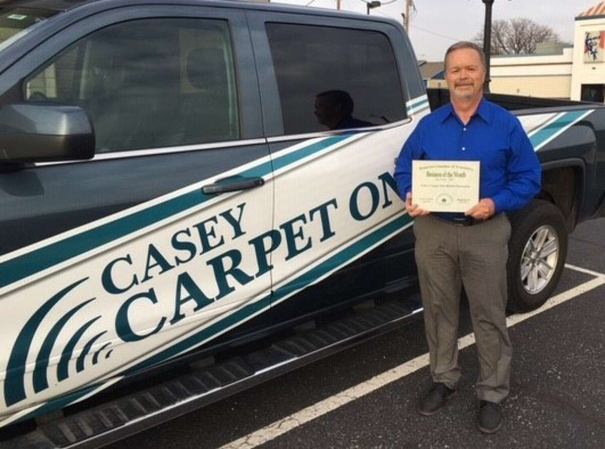 Chris Dunn accepted the December 2021 Business of the Month award from the Plainview Chamber of Commerce on behalf of Casey Carpet One Mobile Showroom. 