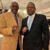 Hillhouse great and Pro Football Hall of Famer Floyd Little (left) shows off Hall of Fame ring alongside Hillhouse coach Reggie Lytle, showing off his 2016 state championship ring, during the New Haven Gridiron Club’s 75th Annual Awards Banquet at Cascade Fine Catering in Hamden, Dec. 5, 2019