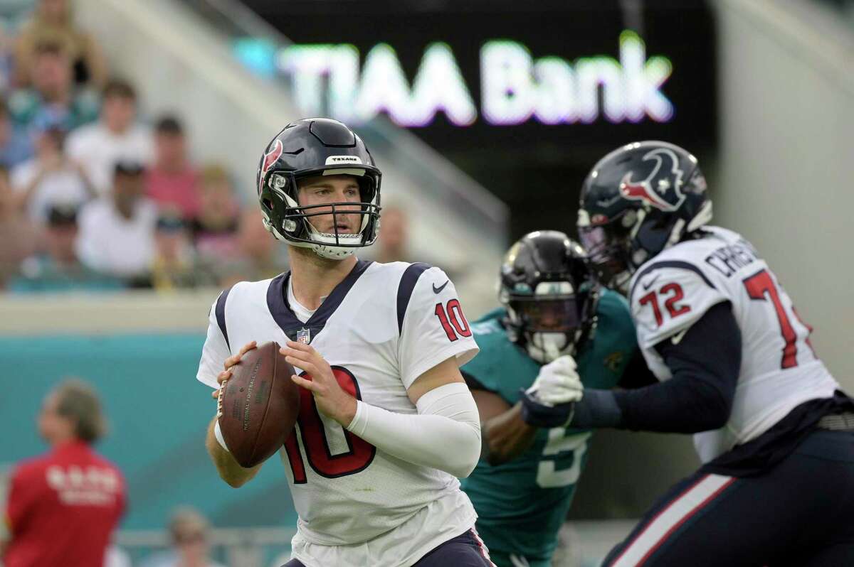 Houston Texans quarterback Davis Mills looks for a receiver during the first half of a Dec. 19 game against Jacksonville.