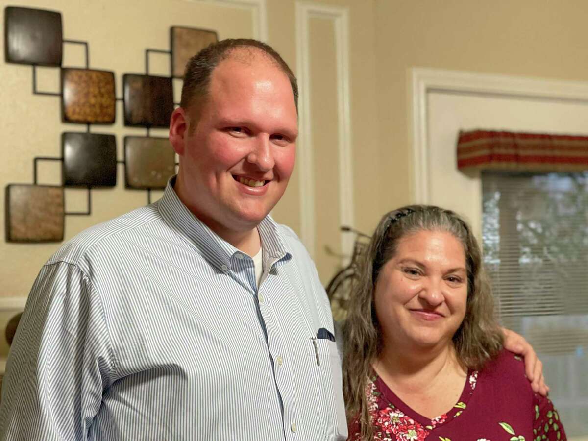 Brandon Bartoskewitz, a homicide detective with the Montgomery County Sheriff’s Office, smiles while standing next to his birth mother, Shawna Goodson. The pair met for the first time in November in San Antonio after the detective, who was adopted at birth, found his mother through DNA analysis.