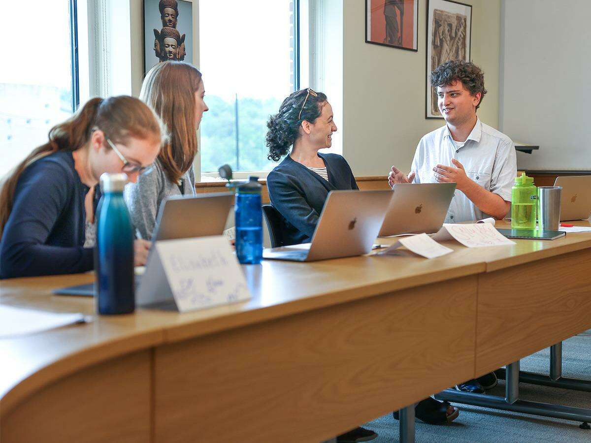 St. Luke's School in New Canaan Upper School Teaching Fellows recently participate in the August Institute at the school. L-R: Elisabeth Howard (Math), Maggie Calcio (Chemistry), Sally Rose Zuckert (History), and Alex Robertson (English).