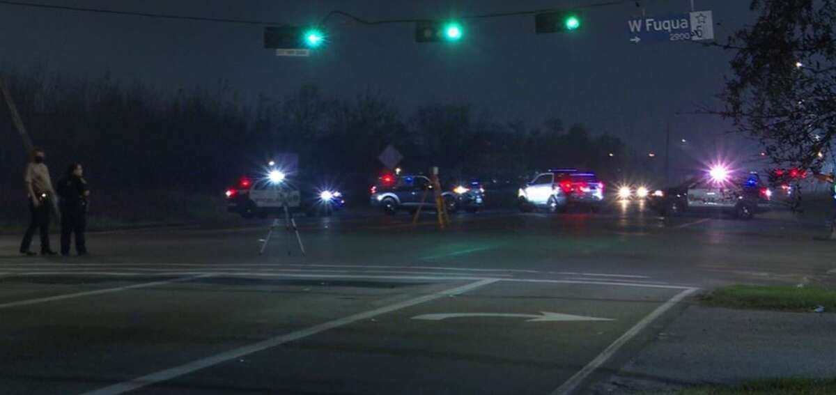 Police investigate a crash where an off-duty Harris County Sheriff's Office deputy fatally struck a man  crossing a street in southwest Houston on Thursday, Dec. 30, 2021. 
