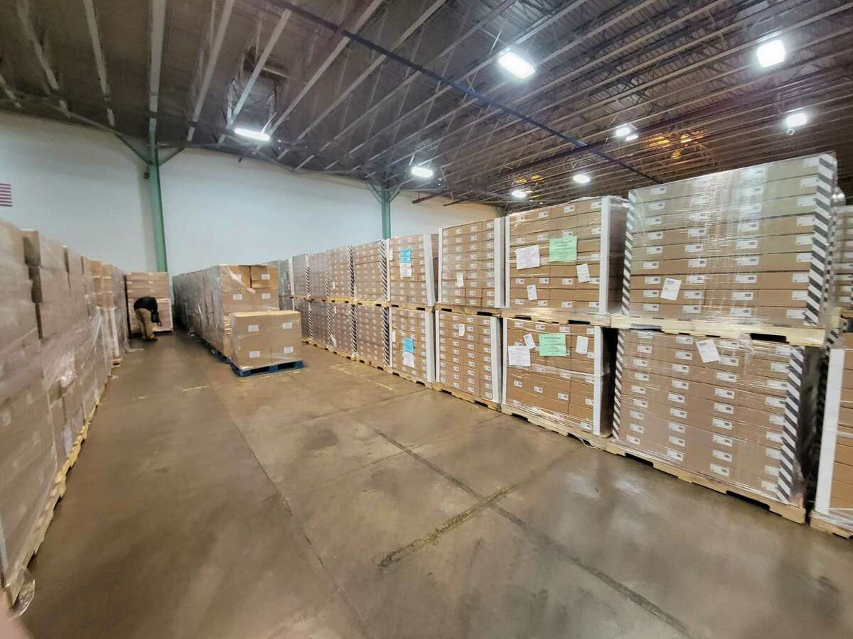 Early Friday morning, 426,000 at-home COVID tests were delivered to a state warehouse. Some boxes of tests were labeled for other states, including Rhode Island and New York, which Gov. Ned Lamont did not explain.