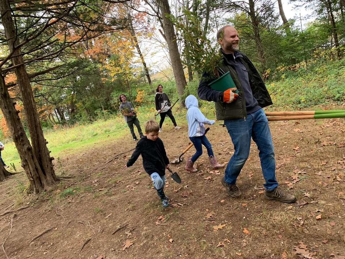 The members of the Wilton Land Conservation Trust, WCLT, and community volunteers recently planted trees, and shrubs, Sunday, Oct. 24, to restore the general habitat. With volunteers from the community, the members planted native trees, and shrubs along the hiking trail on Schenck's Island in Wilton.