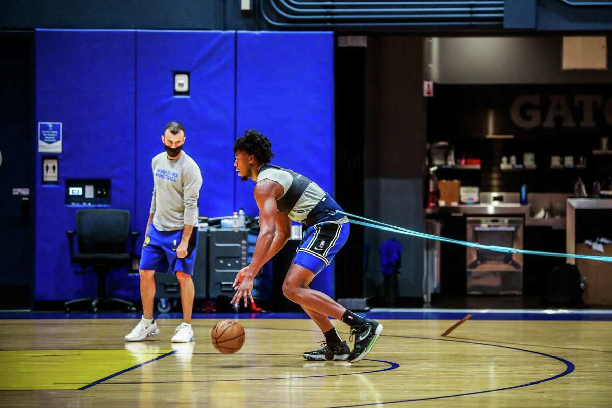 Golden State Warriors player James Wiseman does drills during the Warriors shoot around at Chase Center on Tuesday, Dec. 7, 2021 in San Francisco, California.