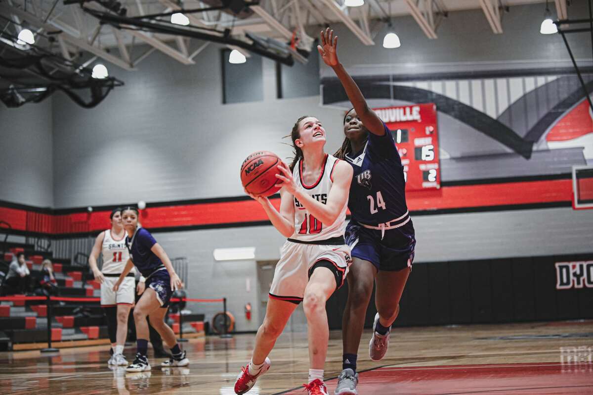 Averill Park graduate Anna Jankovic of the D'Youville women's basketball team looks for a shot in a game this season.
