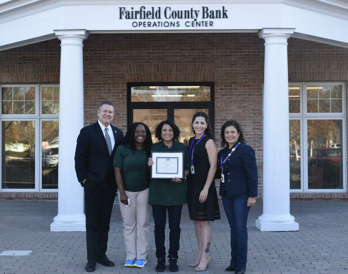 RVNAhealth recently announced the recipients of its annual Couri Family Nursing scholarships. Above is Fairfield County Bank President Dan Berta, recipients Liz Dladla, and Hilary Stubbs, and RVNAhealth’s President, and CEO Theresa Santoro.