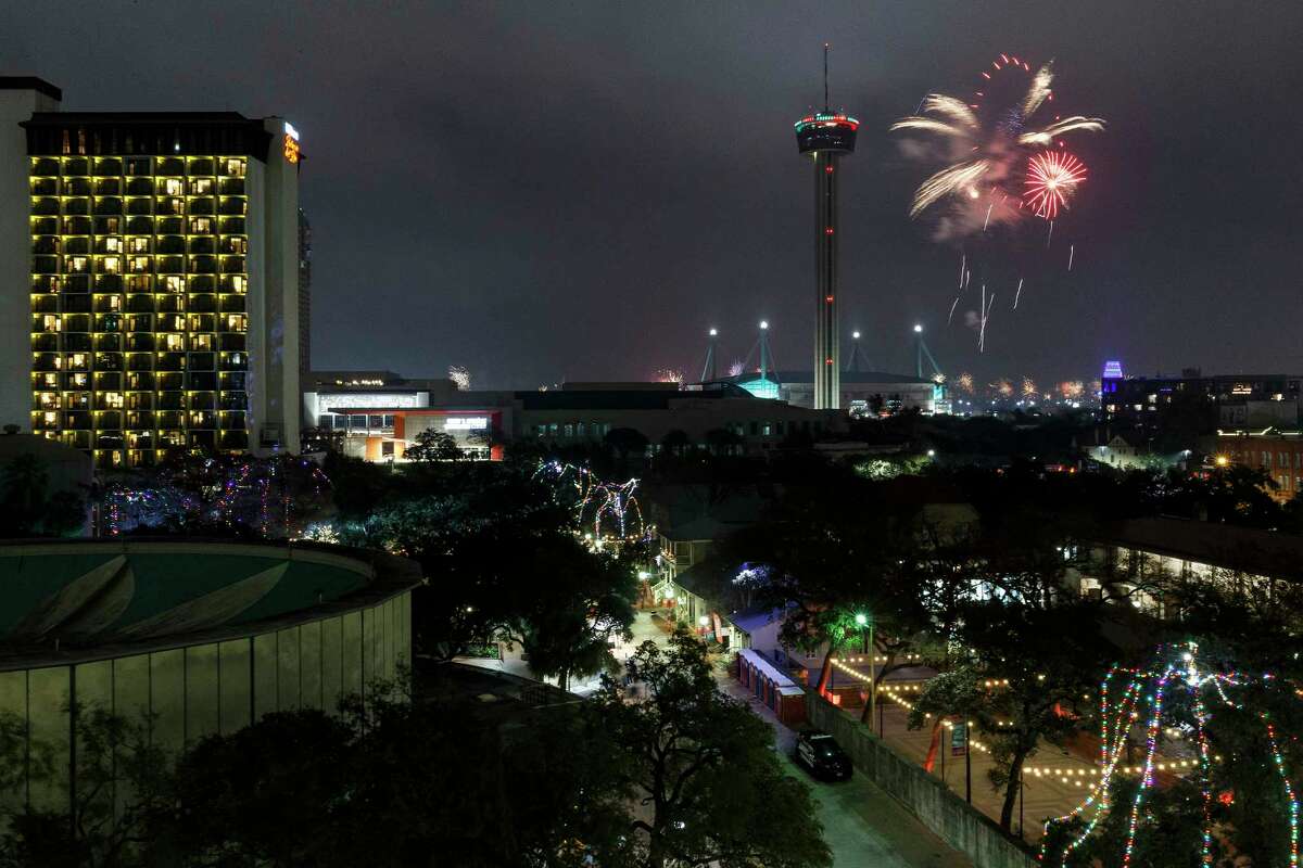 Fireworks light up the sky by the Tower of the Americas to ring in the new year in Downtown San Antonio, Texas, Saturday, Jan. 1, 2022. The city’s official New Year’s Eve celebration was back on again after taking a hiatus last year due to the COVID-19 pandemic.