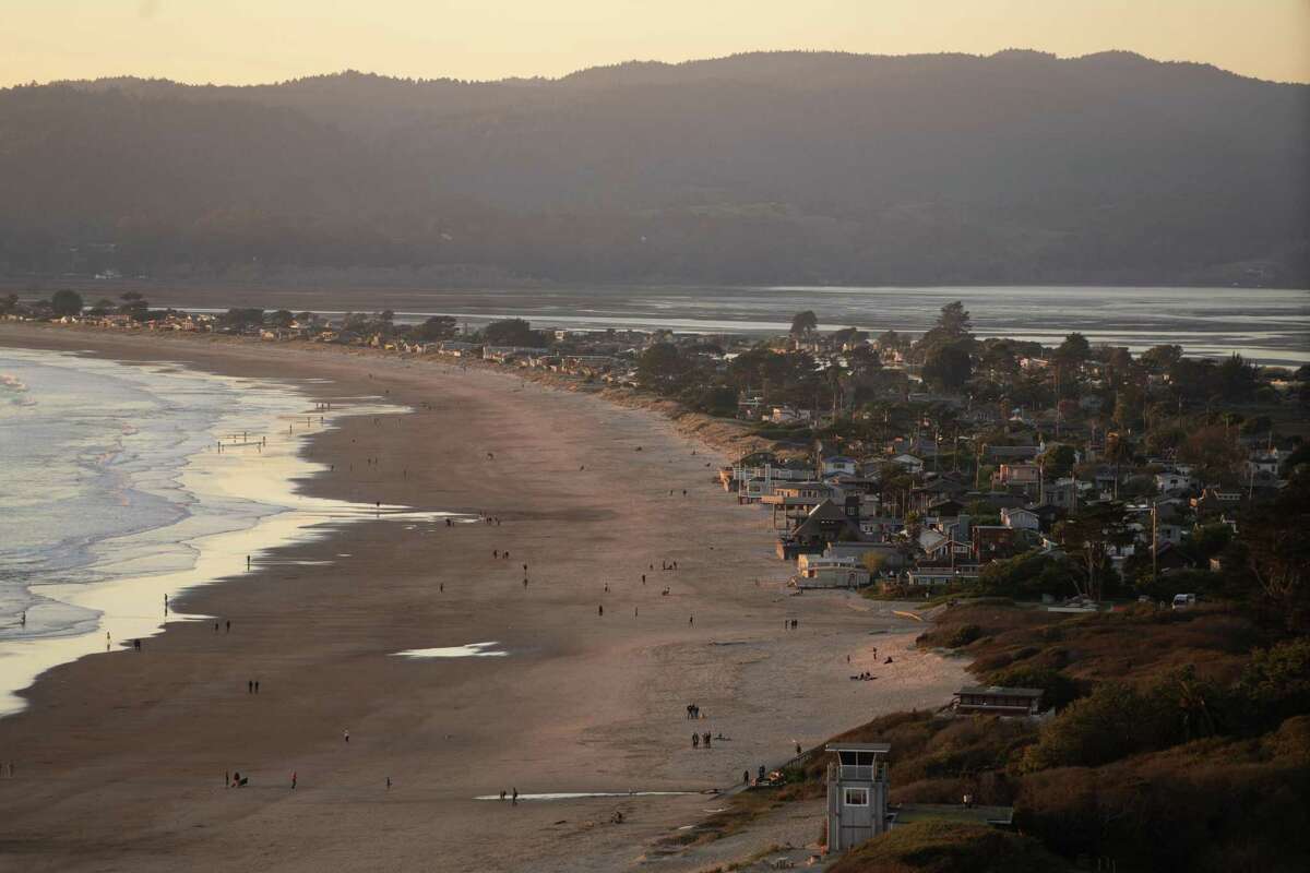 The Pacific Ocean provides a scenic backyard for beachfront homes at Stinson Beach, Calif. Chilly temperatures for New Year’s weekend will give way to a chance of rain on Monday and Tuesday.