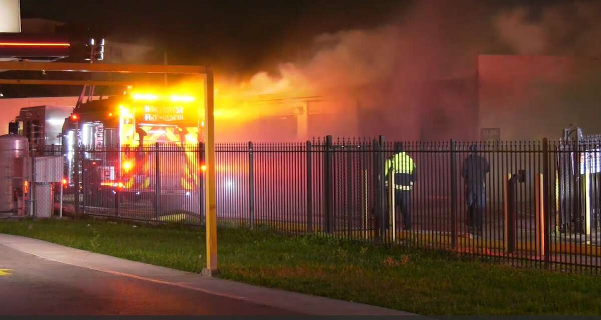 Firefighters work to put out a blaze at the Great Value Storage Facility on Jan. 2, 2021, in Tomball. 