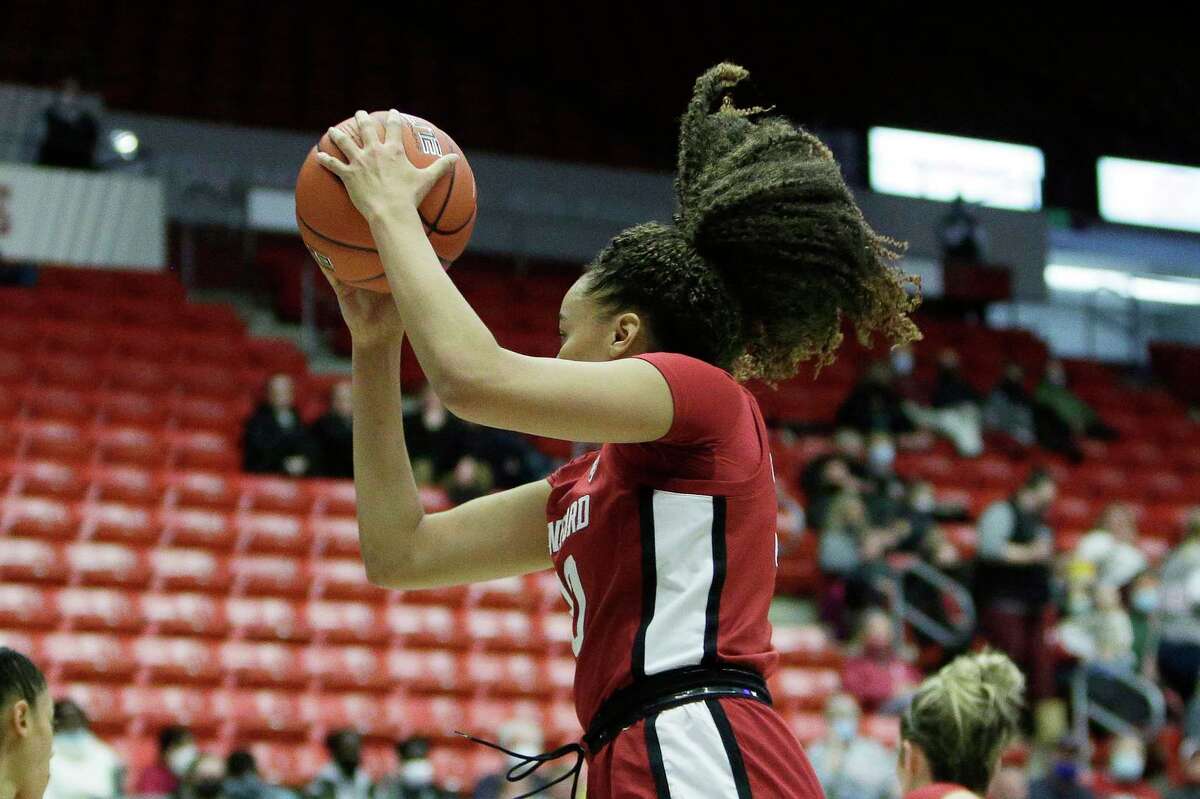 Stanford guard Haley Jones grabs a rebound during the first half of an NCAA college basketball game against Washington State, Sunday, Jan. 2, 2022, in Pullman, Wash. (AP Photo/Young Kwak)