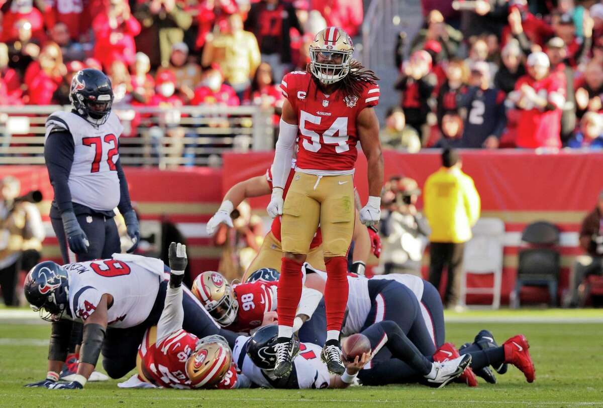 Fred Warner (54) reacts after a sack of Davis MIlls (10) in the second half as the San Francisco 49ers played the Houston Texans at Levi’s Stadium in Santa Clara, Calif., on Sunday, January 2, 2022.