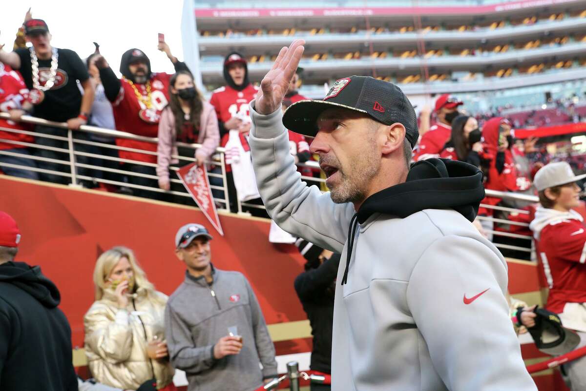 San Francisco 49ers' Kyle Shanahan acknowledges cheers after Niners' 23-7 win over Houston Texans in NFL game at Levi's Stadium in Santa Clara, Calif., on Sunday, January 2, 2022.