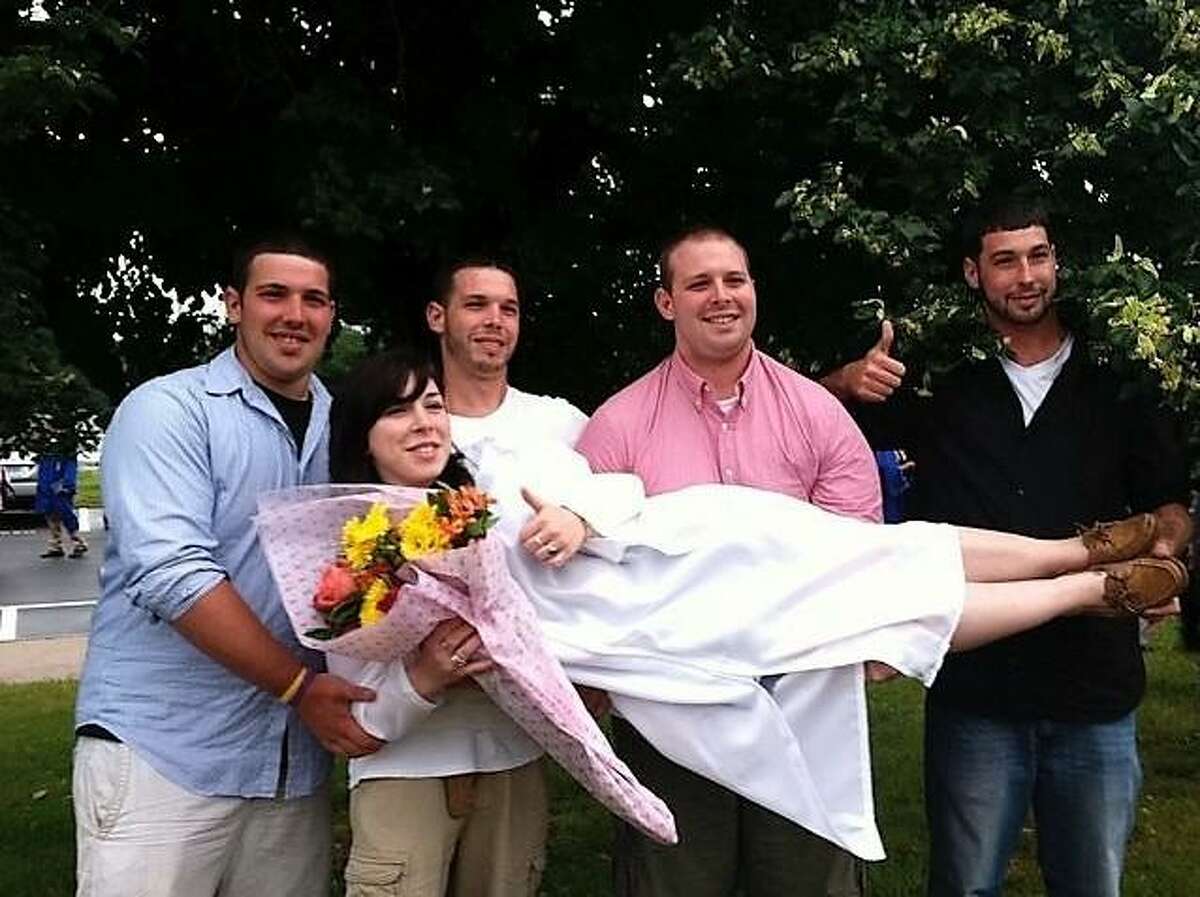 From left, siblings Troy, Meghan, Matthew, Justin and Kyle Fitzgerald gather for a family photo in Southington in 2011. Kyle died in 2013 after taking heroin. Matthew died in 2017 after taking fentanyl. Their opioid addiction began after taking OxyContin, according to their mother, Liz Fitzgerald.