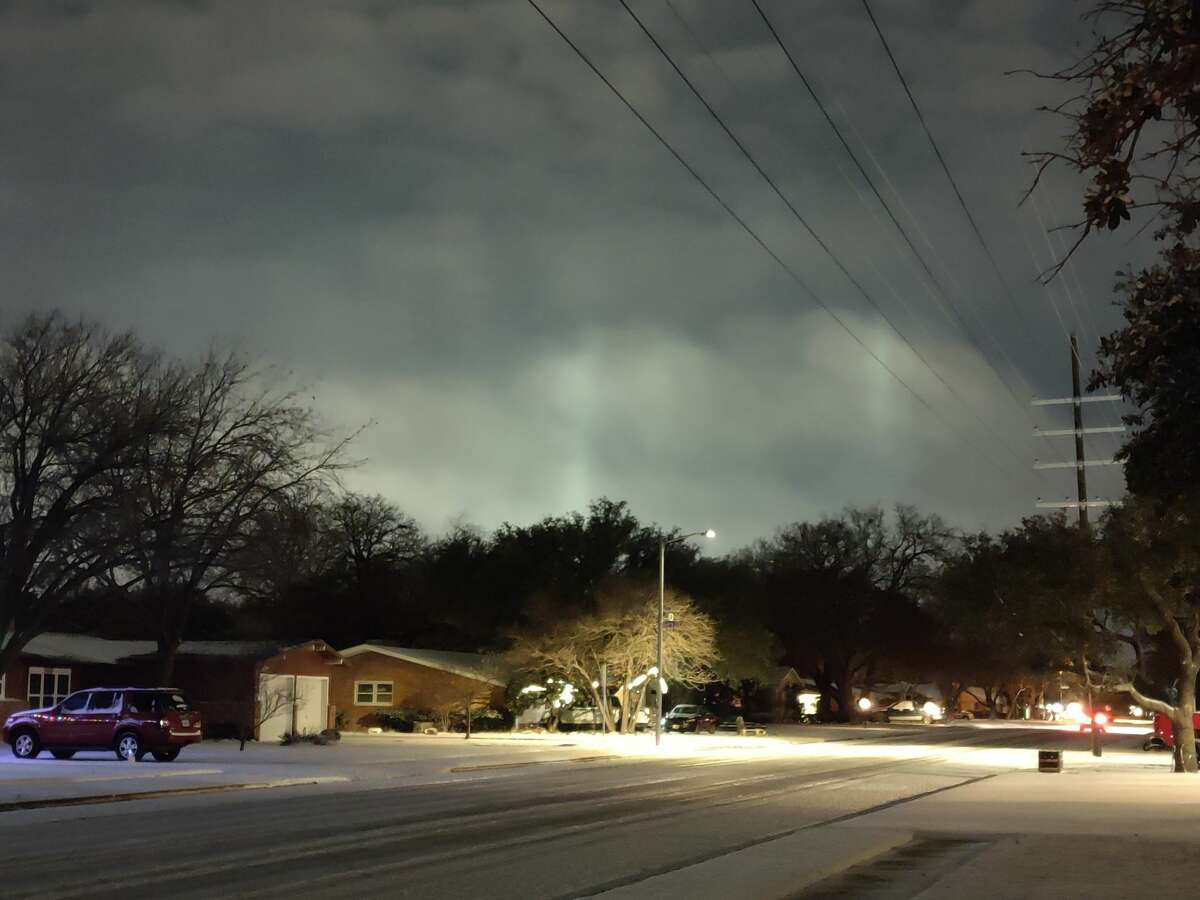 Light pillars are seen over central Lubbock on Jan. 1, 2021. These are halo phenomena caused by light reflecting off ice crystals. Over the weekend, some parts of Lubbock received almost 3 inches of snow.