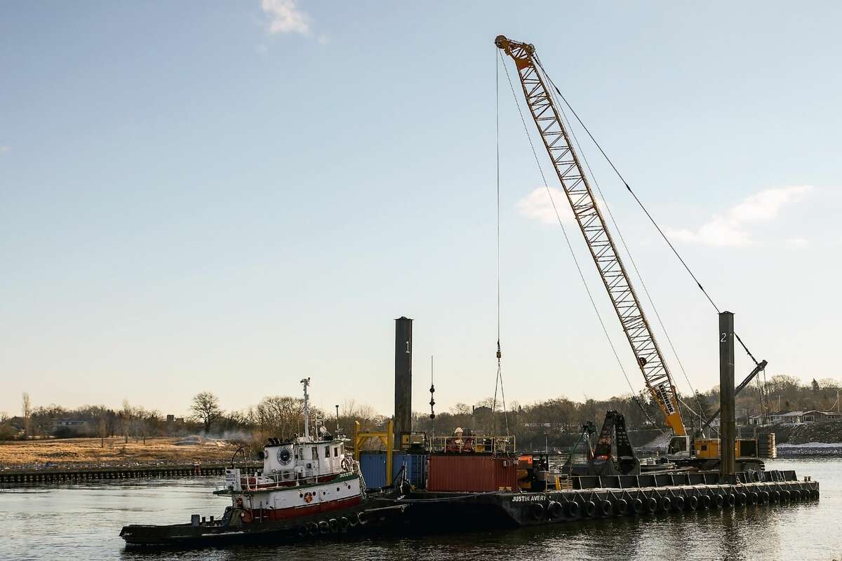 A large barge could be found at the First Street Boat launch on Monday morning. The barge had a crane attached to it and appeared to be working on the dock by the boat launch. 