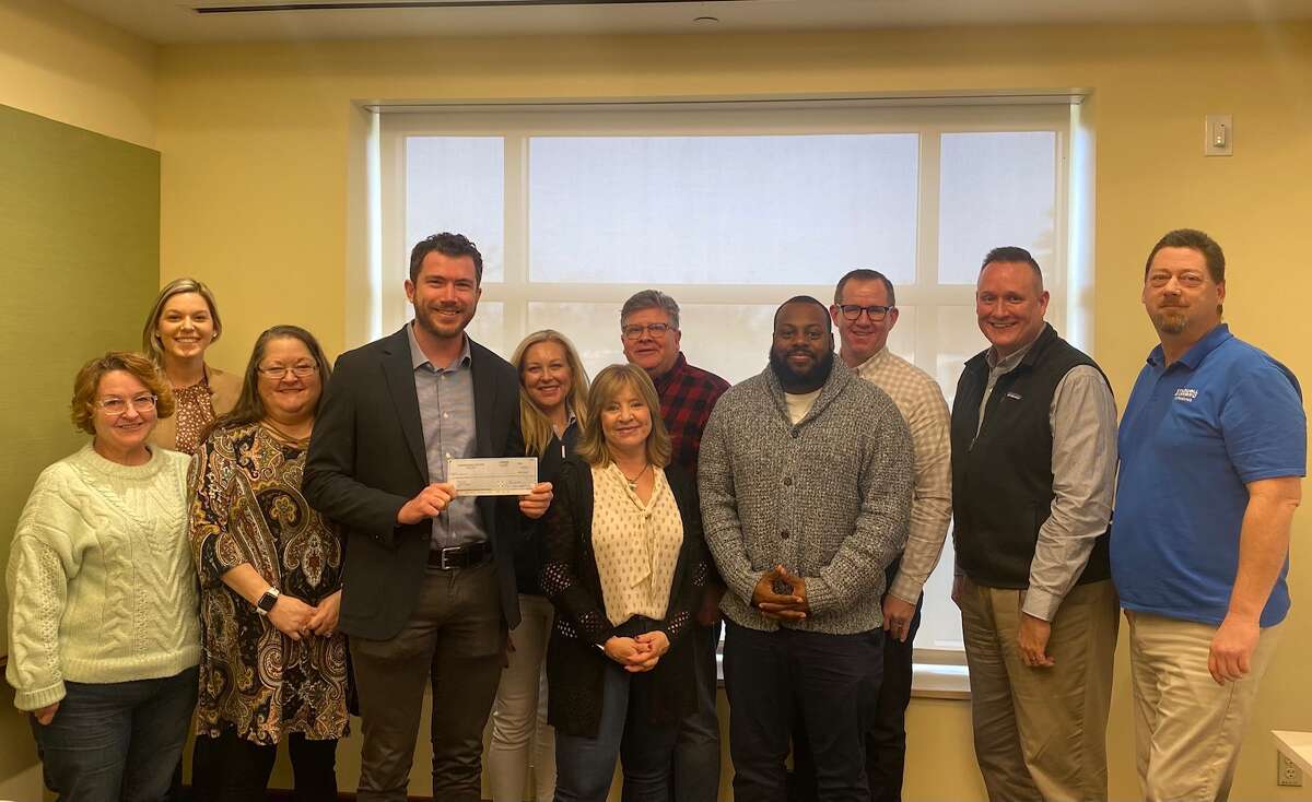 At its annual retreat, the Midland Board of REALTORS® Board of Directors presented a check in the amount of $10,000 to Grant Murschel, Director of Planning & Community Development for the City of Midland. The funds support the City's master planning efforts and come from a Smart Growth Grant from the National Association of REALTORS®.