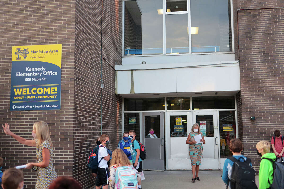 In this file photo, students arrive for the first day of school at Kennedy Elementary on Aug. 31. Manistee Area Public Schools superintendent Ron Stoneman said the district will continue with its current coronavirus safety measures to start the new year.