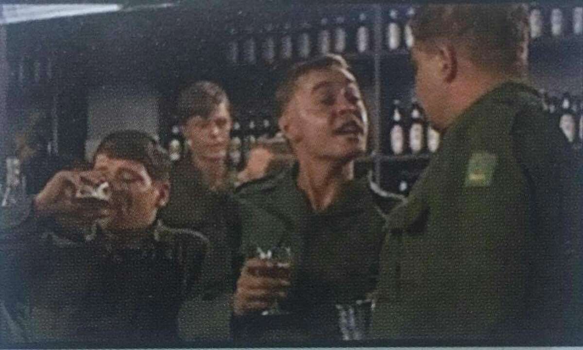 Yup, that's him, David Bowie, in the background and second to left. It's all that's left of his performance in his (uncredited) big screen debut, 1969's comedy-drama "The Virgin Soldiers," after he was mostly edited out. By the time he made his next film, 1976's "The Man Who Fell to Earth," he was already a rock superstar.