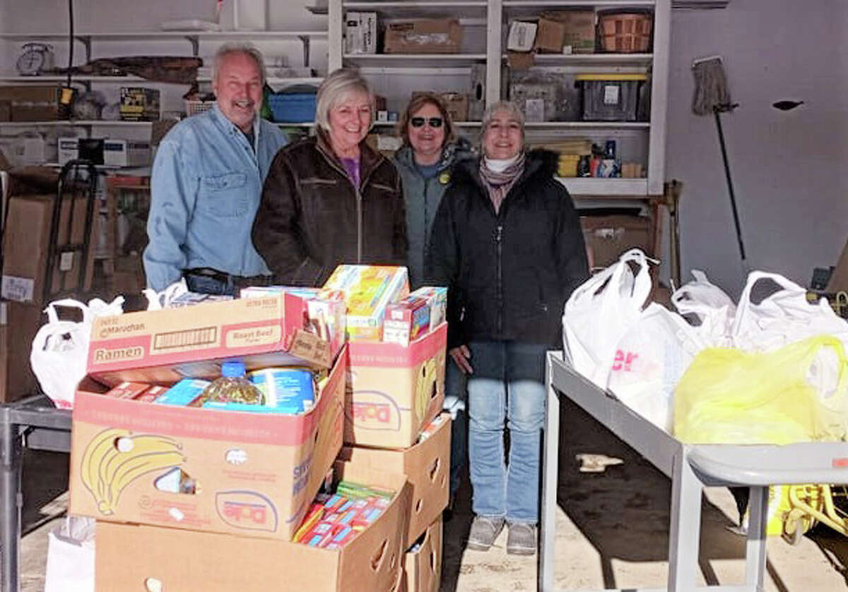 Members at VFW Post No. 5315 organized a food drive to benefit the people of Lake County through Bread of Life Food Pantry. Pictured left to right, Terry and Cindy Hemmeke, who delivered the food to the pantry; Dona TenBrock, pantry volunteer; and Lynne Mills, pantry director.