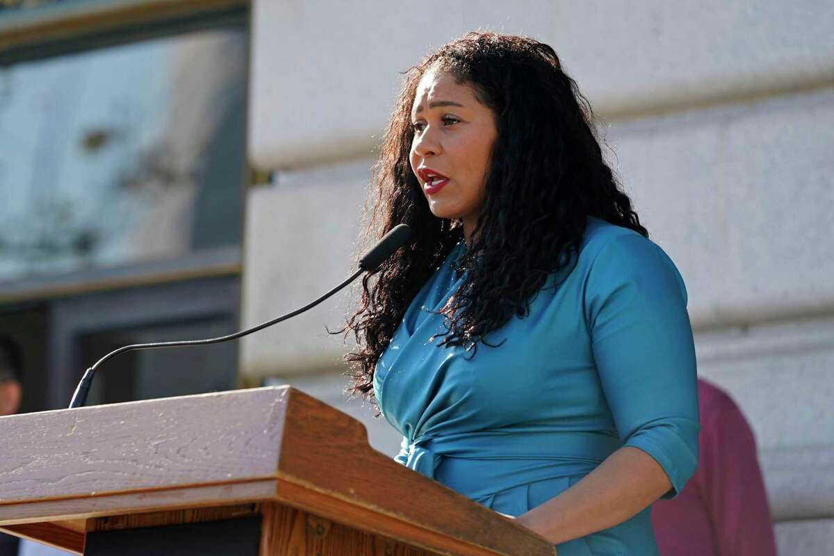 FILE - San Francisco Mayor London Breed talks during a briefing outside City Hall in San Francisco on Dec. 1, 2021. Breed on Tuesday filed a ballot measure that will ask San Franciscans to expand the circumstances under which police can monitor surveillance cameras in real time, advancing a key element of her plan to crack down on crime in the Tenderloin and citywide. (AP Photo/Eric Risberg, File)