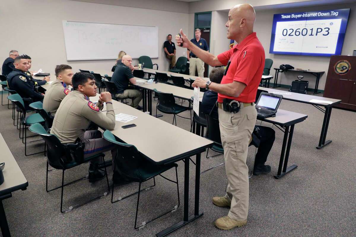Travis County Precinct 3 Constable Sgt. Jose Escribano teaches a class for area law enforcement officers on fake paper license tags at The Woodlands Emergency Training Center on Sep. 24 in Conroe.