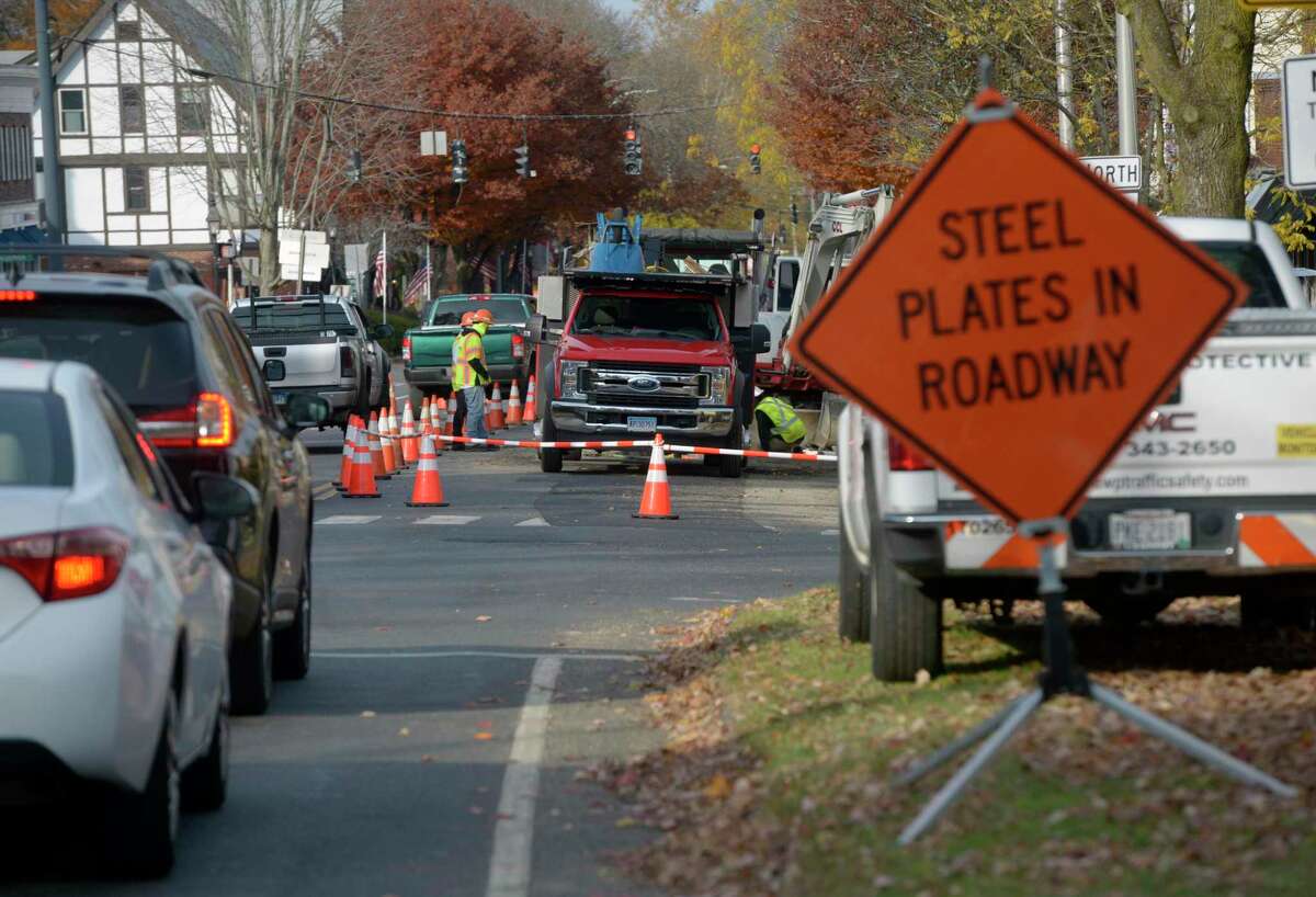 Utility crews complete work on Main Street between Governor and Prospect in anticipation of a major realignment project set to break ground this month. Wednesday, November 17, 2021, Ridgefield, Conn.