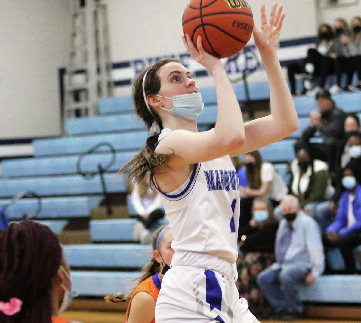 Marquette Catholic's Abby Williams, shown earlier this season in a game at Alton, scored a season-high 20 to lead the short-handed Explorers to victory Monday night over Granite City in Alton.