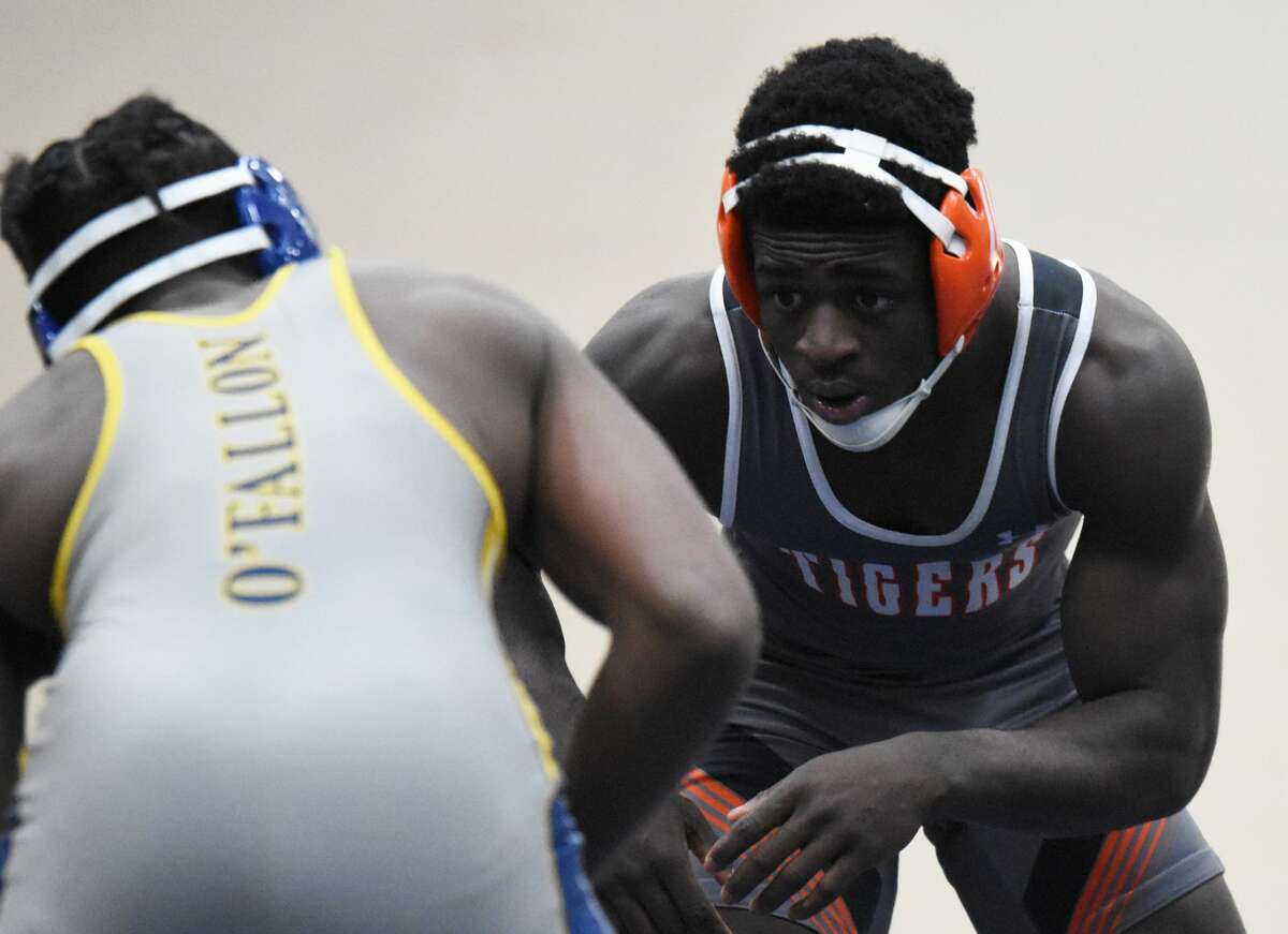 Edwardsville's Jorden Johnson competes against O'Fallon's Terrence Willis III in the 160-pound weight class of a dual on Dec. 30 in O'Fallon.