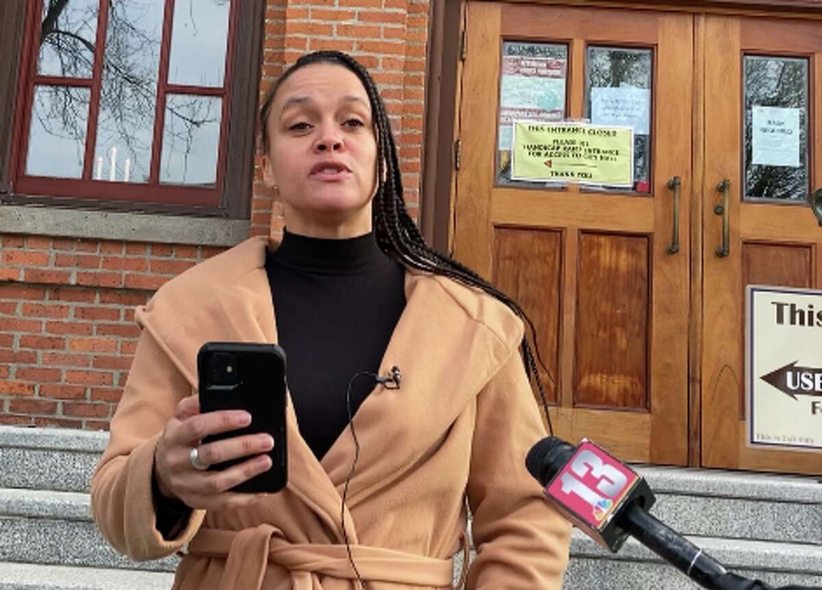 Jamaica Miles speaks in front of Saratoga Springs City Hall on Tuesday, Jan. 4, 2022, after appearing in City Court on charges stemming from a July 14, 2021 protest. She vowed to fight the charges of unlawful imprisonment and disorderly conduct.