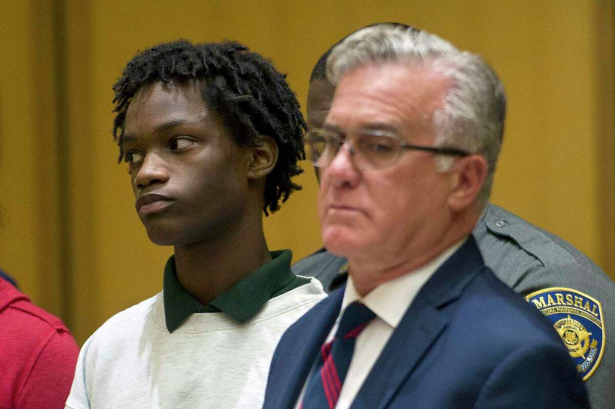 Sirus Dixon, 15, gets arraigned on a murder charge for the shooting death of Antonio Robinson inside the Stamford Superior Court House in Stamford, Conn. on Wednesday, Sept. 12, 2018.