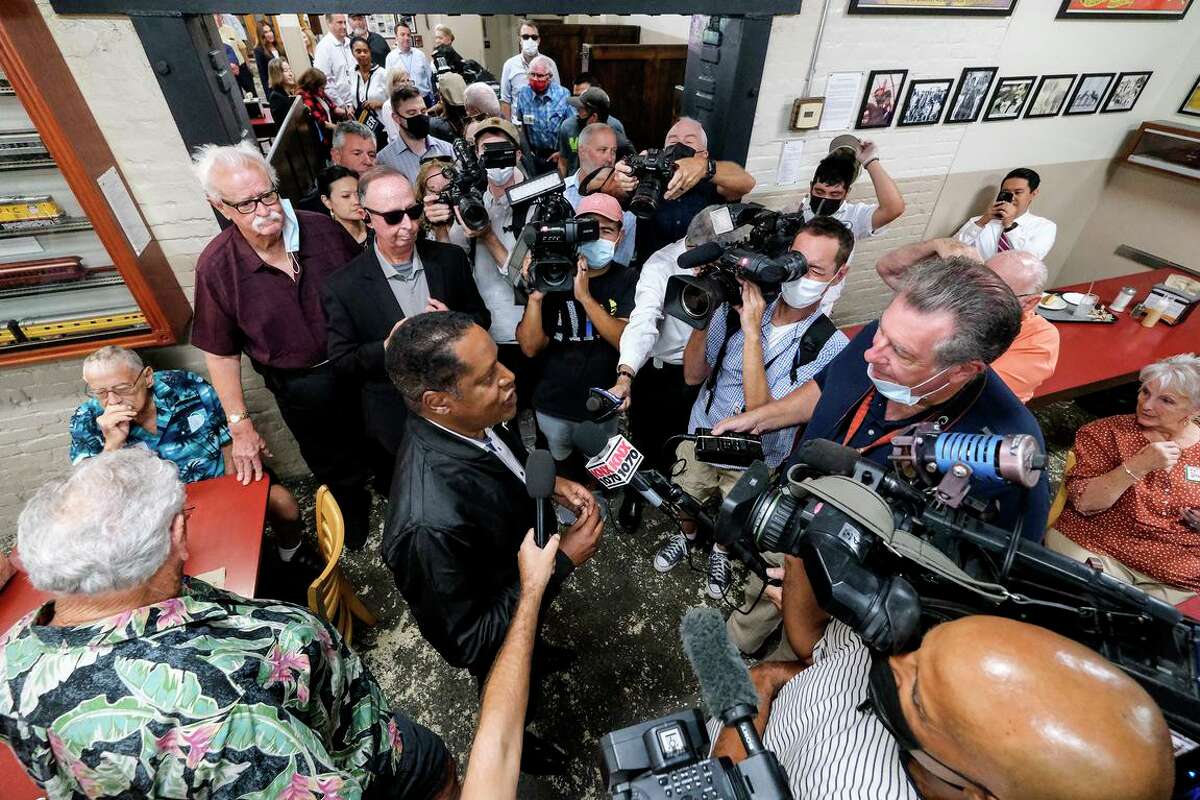 Republican conservative radio show host Larry Elder is surrounded by media while he visiting Philippe The Original Deli in Los Angeles during his campaign to oust California Gov. Gavin Newsom in a recall election. Elder announced he will not challenge Newsom again in 2022.
