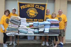 The Probus Club of Greater New Haven collected linens at its Wrapped in Love event in August. From left, Betty Litto, David Wolffe, Roy Lukacs, Sheila Mendlestein, Les Faiman.