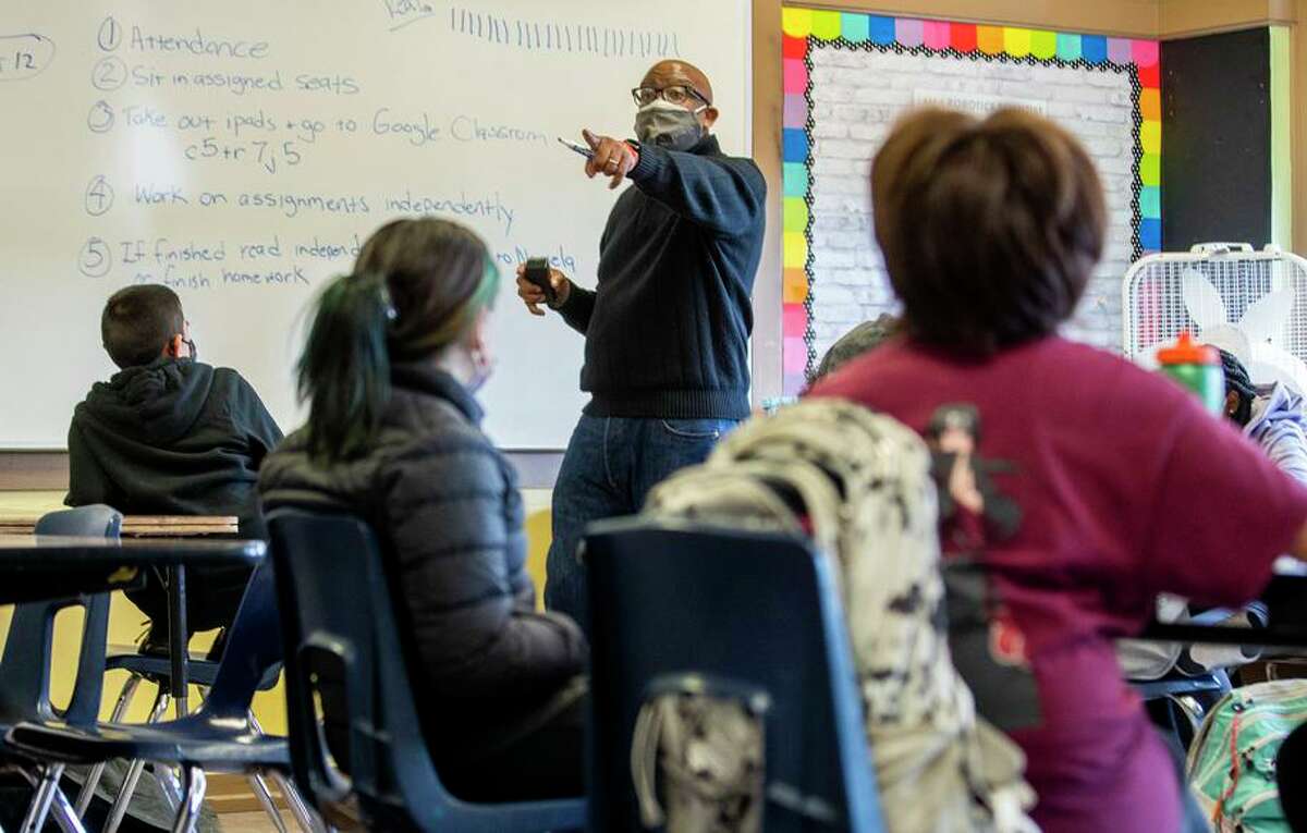 S.F. Superintendent Vince Matthews fills in as substitute teacher for a sixth-grade science class at Everett Middle School.