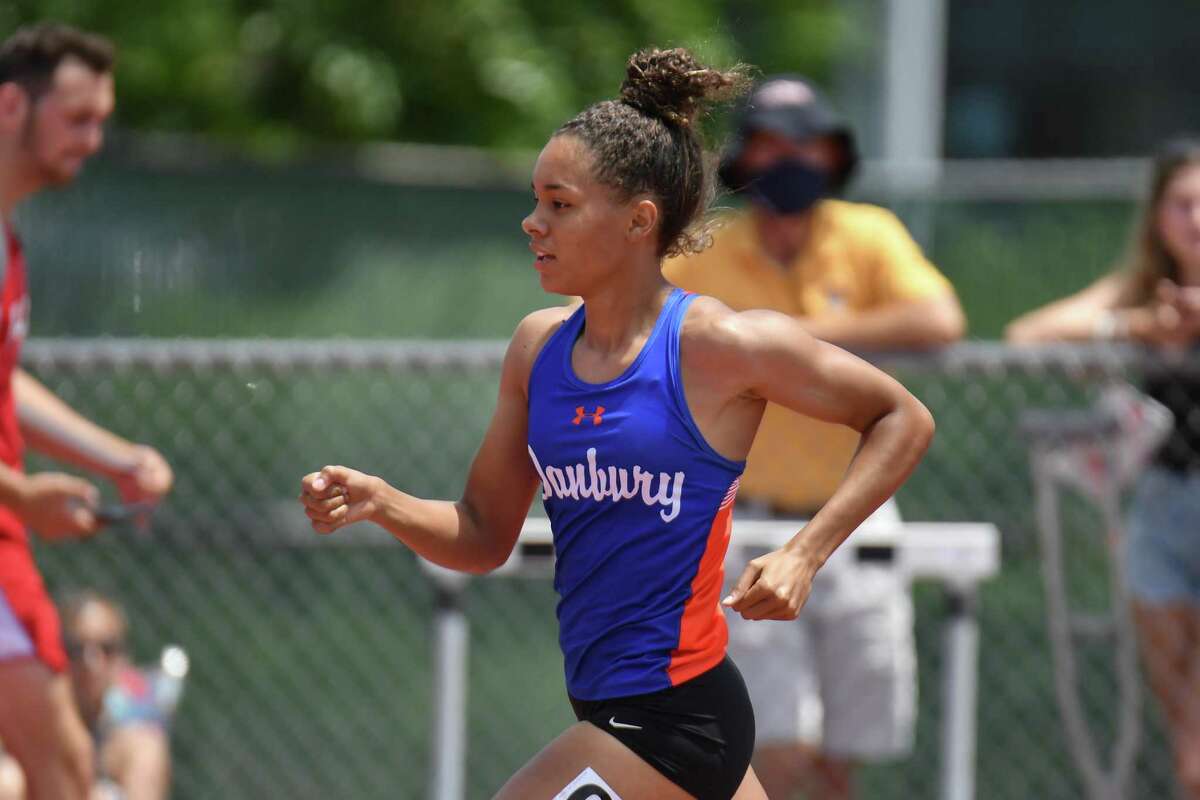 Alanna Smith of Danbury wins the 400 meter run during the CT State Open Track and Field Championship on June 10, 2021 at Willow Brook Park in New Britain, CT.