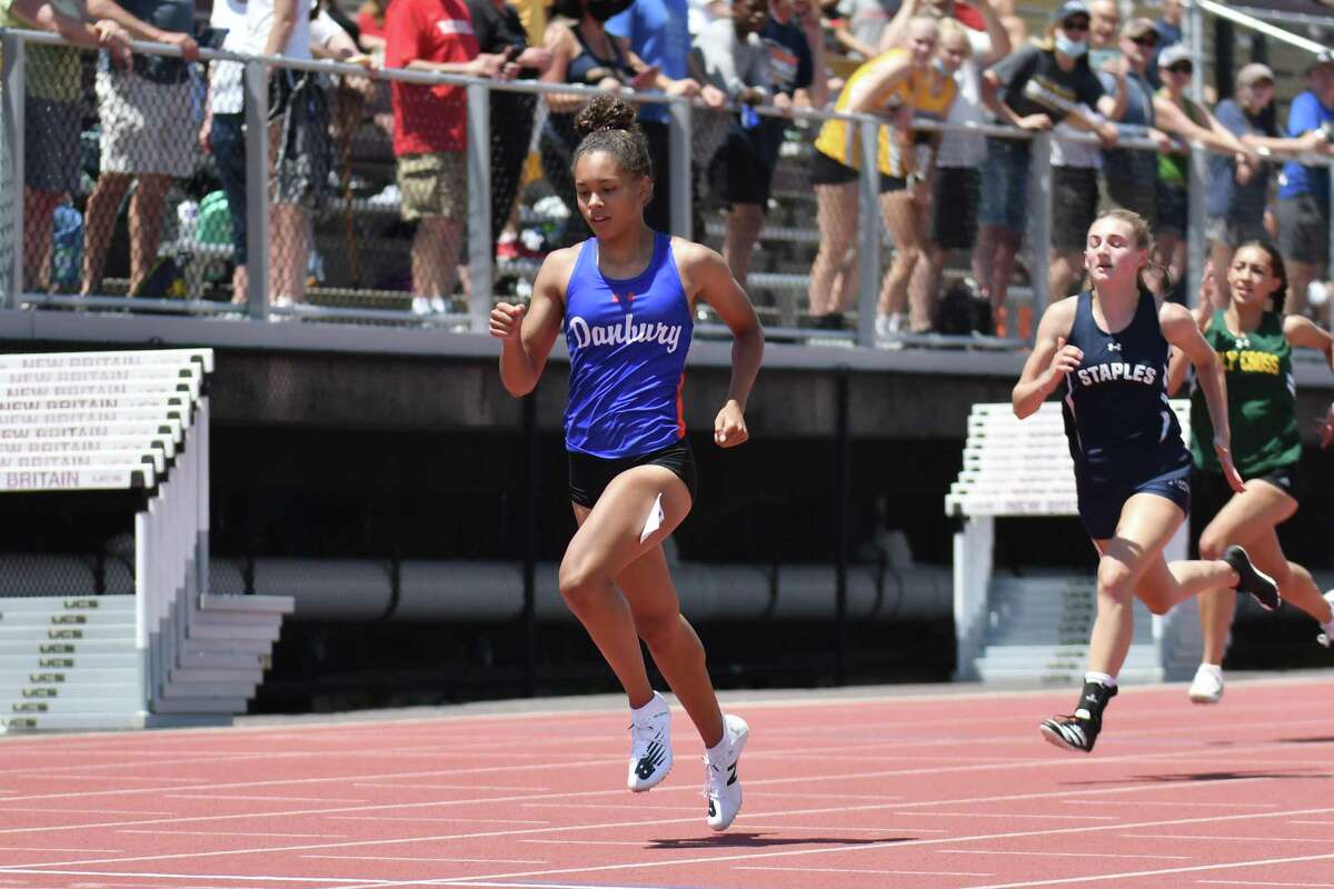Alanna Smith of Danbury wins the 200 meter run during the CT State Open Track and Field Championship on June 10, 2021 at Willow Brook Park in New Britain, CT.