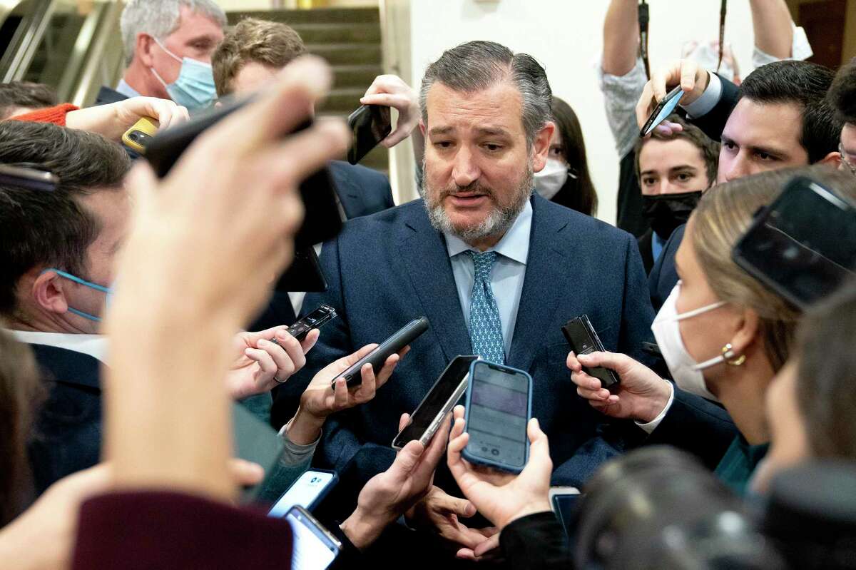 Sen. Ted Cruz (R-Texas) speaks to reporters in the Senate Subway on Capitol Hill in Washington, Dec. 2, 2021. 