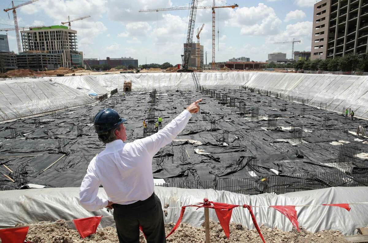 William “Bill” McKeon, president and CEO of the Texas Medical Center, discusses the construction of a 37-acre biomedical research campus as he stands in front of the campus’ water detention area Tuesday, Aug. 31, 2021, in the Texas Medical Center in Houston.