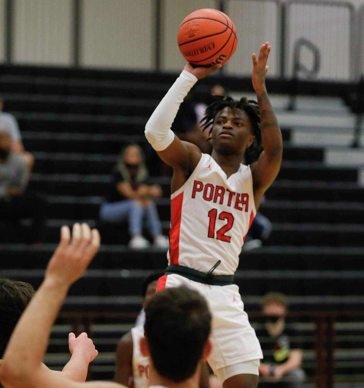Porter point guard Ke'shun Simon (12), shown here last month, scored 22 points against rival New Caney on Tuesday.