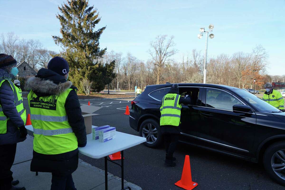 COVID-19 test kits were handed out at Lapham Community Center in New Canaan on Jan. 4.