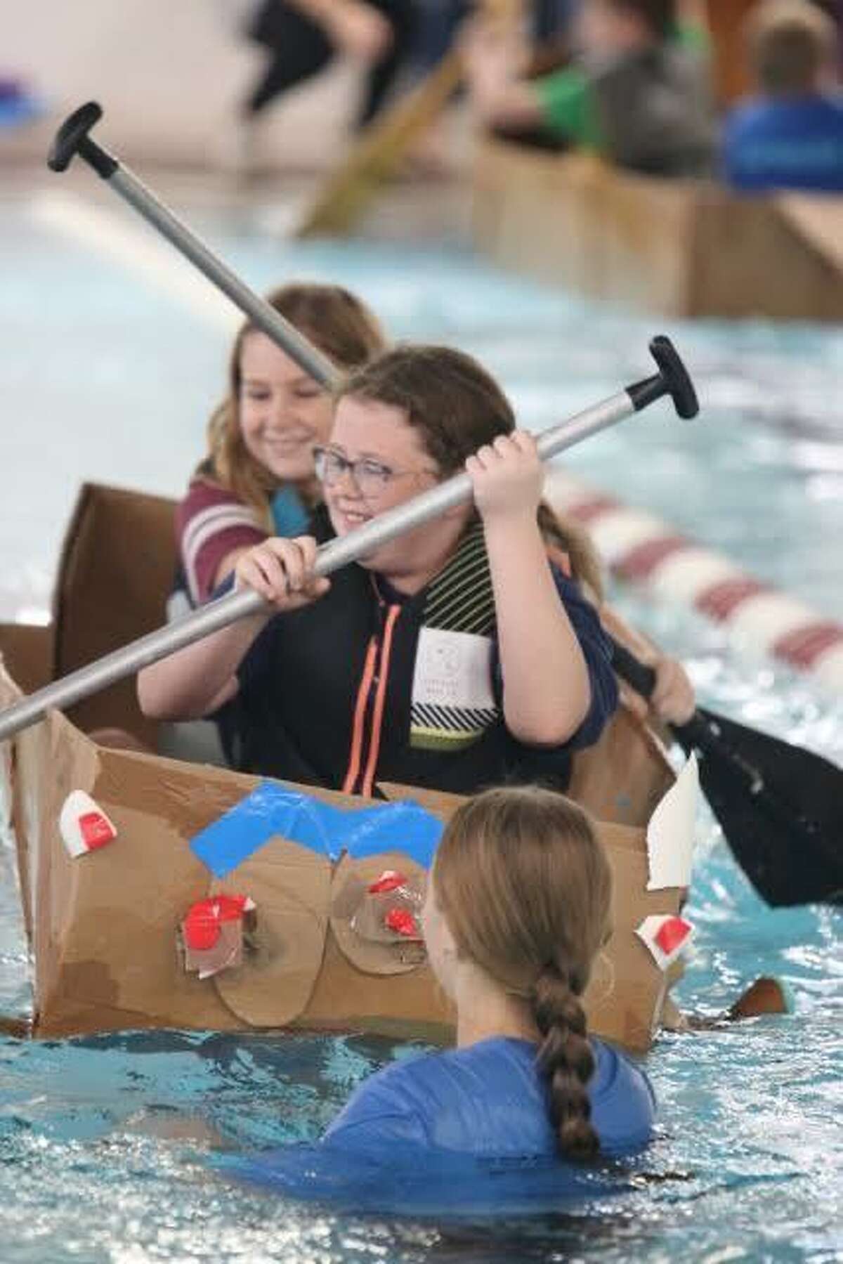 Magnolia ISD students participate in a regatta after working to build cardboard boats throughout the fall 2021 semester.