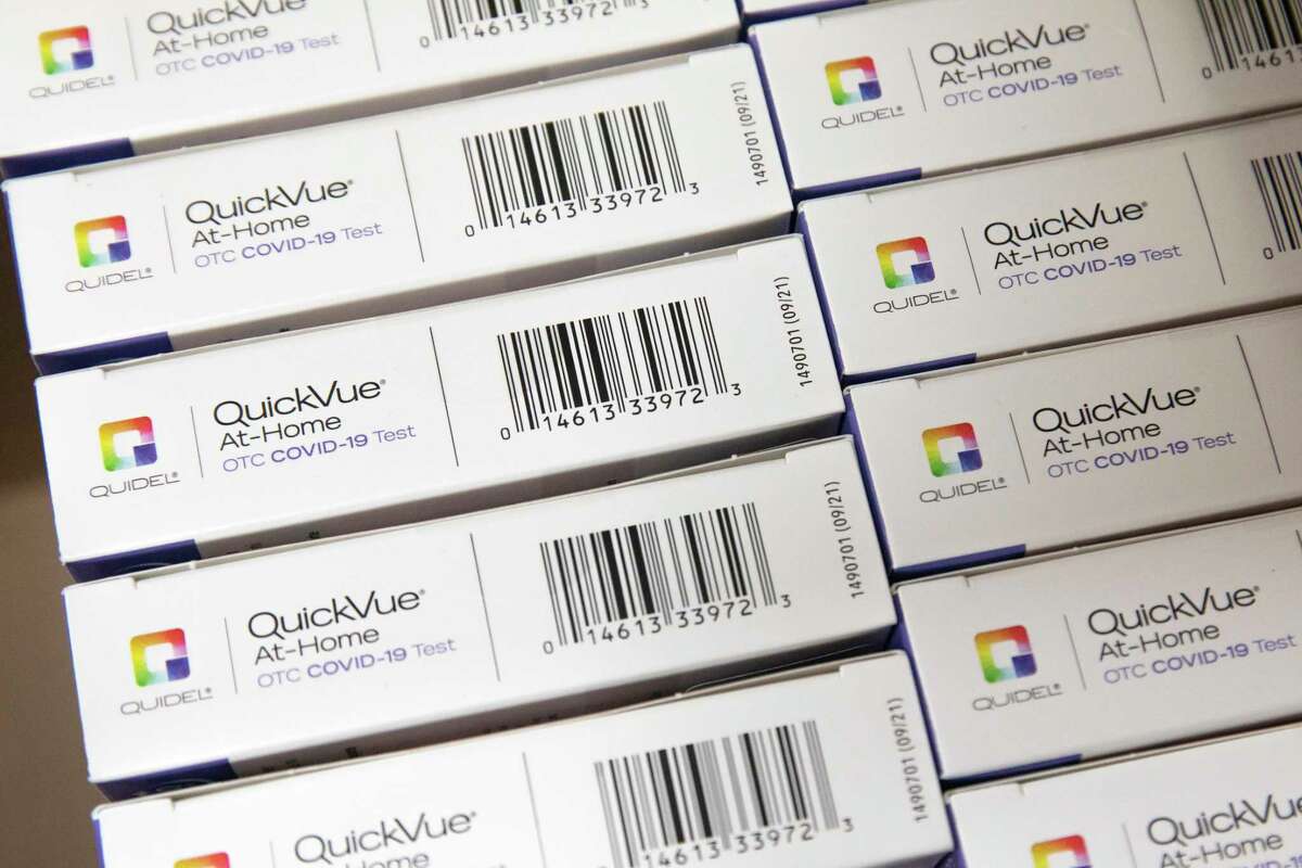 At-home test kits are being distributed to Danbury senior citizens. Free rapid COVID-19 test kits sit in a box as they await to be handed out to residents at Contra Costa County Supervisor John Gioia's office in El Cerrito, Calif., Tuesday, Dec. 21, 2021. (Jessica Christian/San Francisco Chronicle via AP)