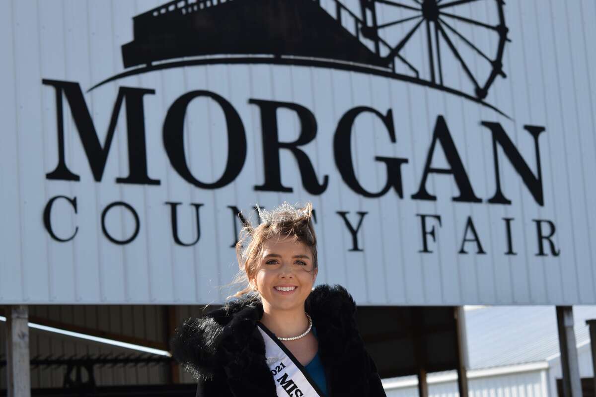 Morgan County Fair Queen Julianne Wilson stands on the fairgrounds where she reigned in 2021.