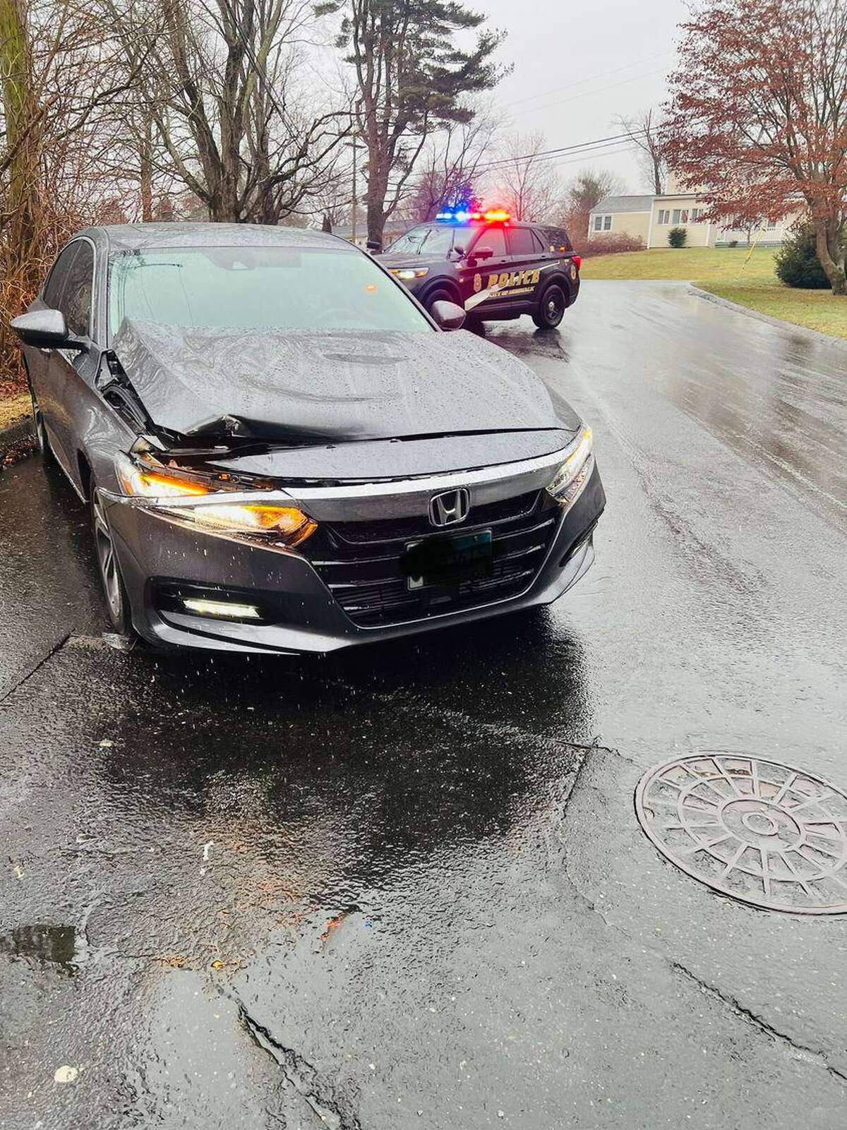 A crash in Norwalk, Conn., on Wednesday, Jan. 5, 2022. Fire and police officials across the state are urging drivers to stay off the roads due to icy conditions Wednesday, Jan. 5, 2022.