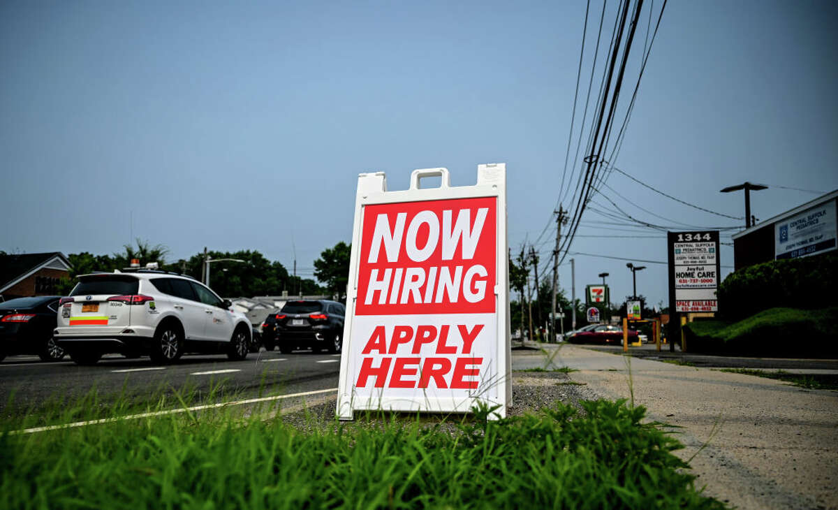 A help wanted sign in Selden, N.Y. (Photo by Thomas A. Ferrara/Newsday RM via Getty Images)