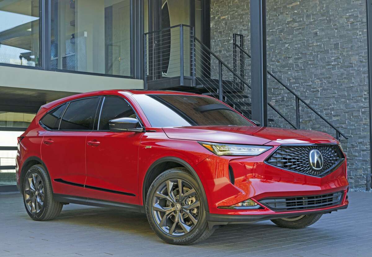 This is the redesigned 2022 Acura MDX in the A-Spec trim level, which starts at $58,400. All-wheel drive is included.