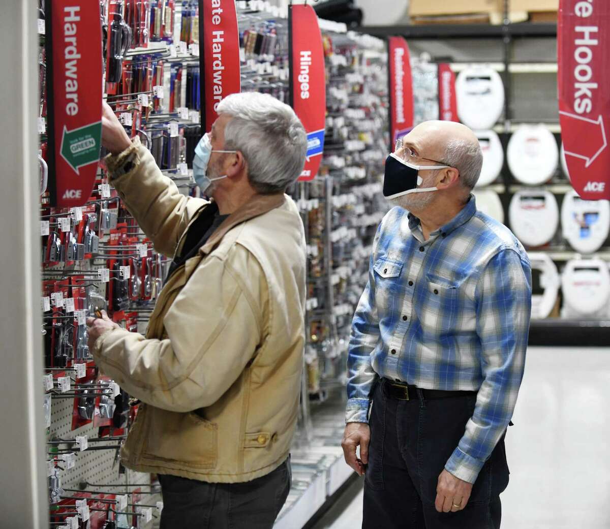 Former Karp's Ace Hardware owner David Fogel assists a customer at the new Rocky's Ace Hardware at 485 Hope St., in Stamford, Conn., on Wednesday, Jan. 5, 2022. Karp’s Ace Hardware, a family-owned-and-operated business for more than 95 years, announced Wednesday that it had been purchased by Rocky’s Ace Hardware, one of the country’s largest family-owned Ace Hardware dealers.