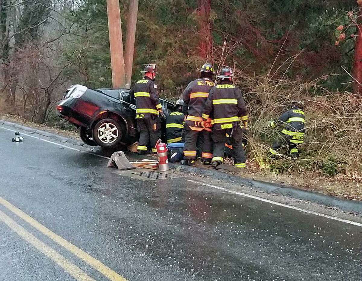 A crash in Westport, Conn., on Wednesday, Jan. 5, 2022. Fire and police officials across the state are urging drivers to stay off the roads due to icy conditions this morning.