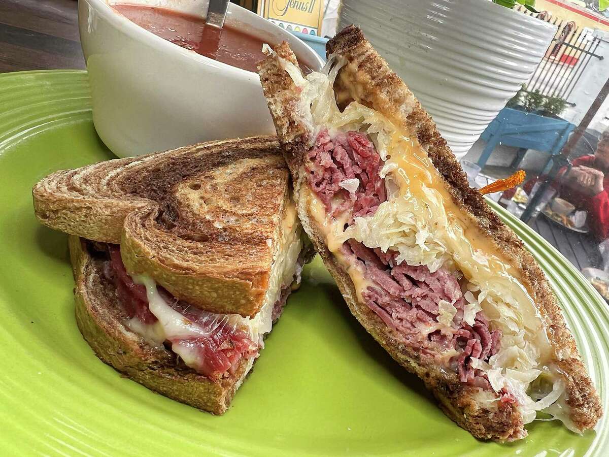 The Reuben sandwich comes with corned beef, sauerkraut, Swiss cheese and Thousand Island dressing on rye toast at W.D. Deli on Broadway. Side options include tomato basil soup.